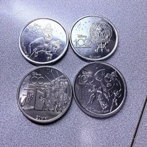 Disney Parks Medallions 100 Years of Wonder Leota Pirates Dog Incredibles Soul